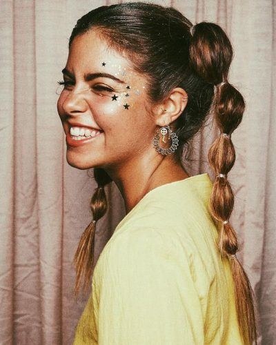 6 Whimsical Festival Hair and Makeup Trends face-glitter-and-faux-braids-400x500 6 Whimsical Festival Hair and Makeup Trends