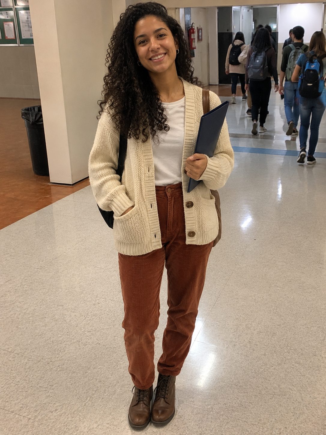 Cardigan over a tee with corduroy trousers