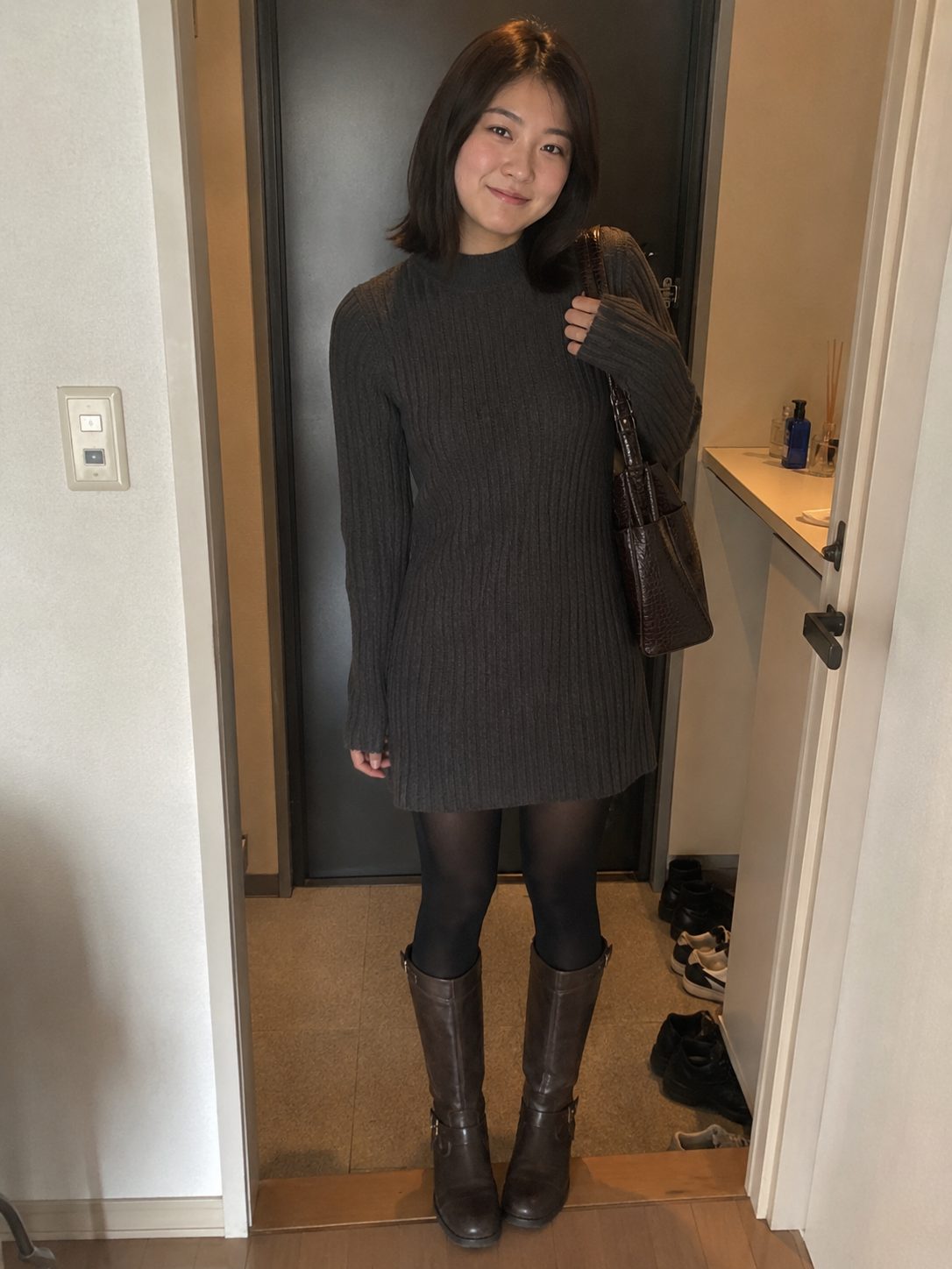 Jumper dress with boots and tights