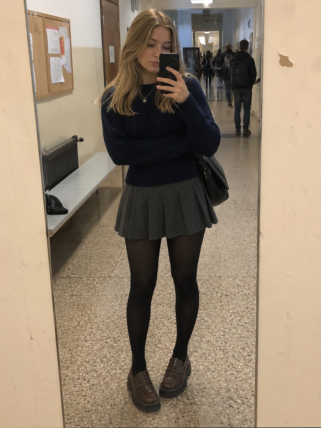 Knit jumper with a pleated skirt and thermal tights