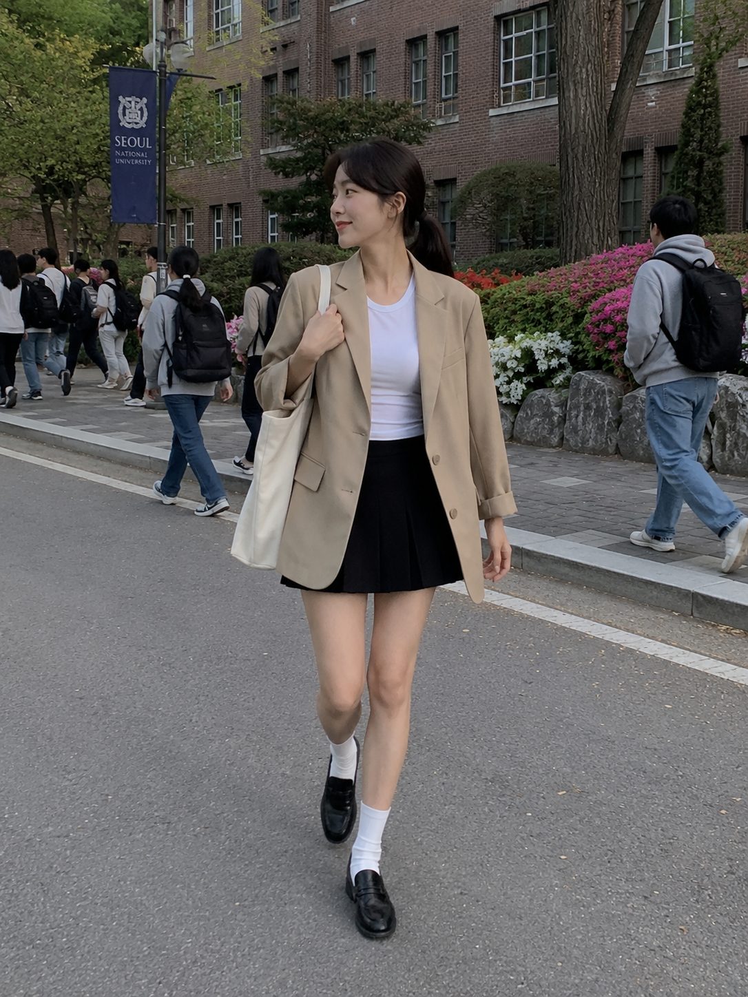 Oversized Blazer With a Pleated Tennis Skirt