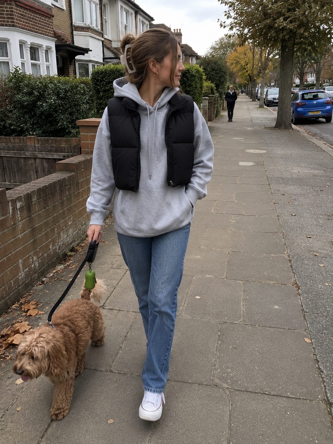 Cropped Puffer Vest Over an Oversized Hoodie