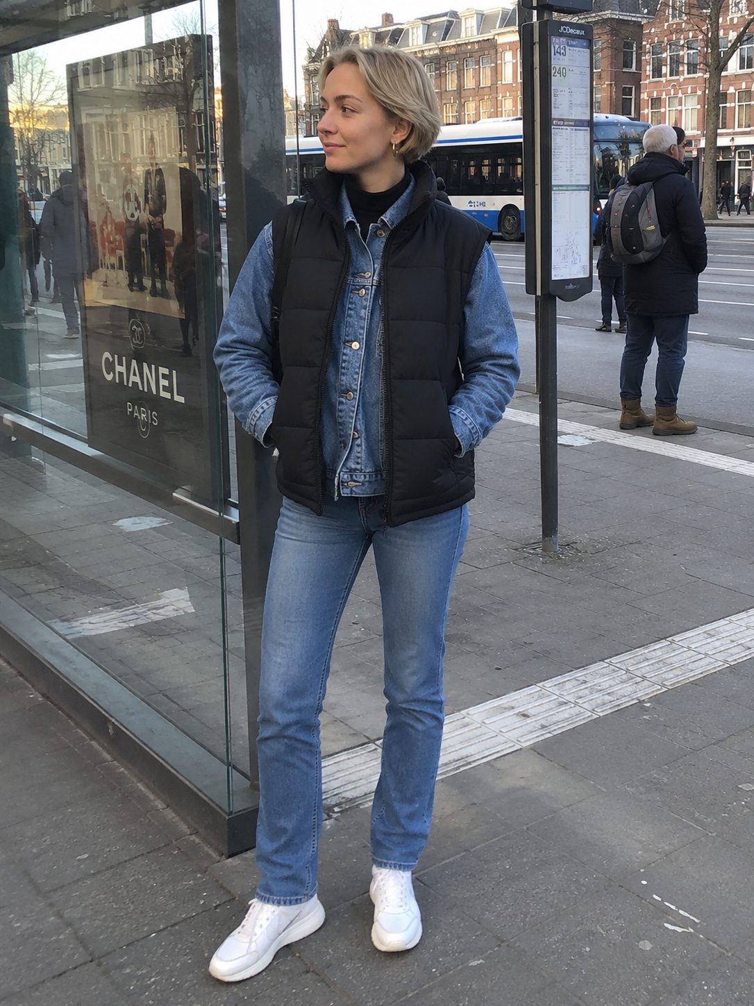 Puffer Vest Layered Over a Denim Jacket
