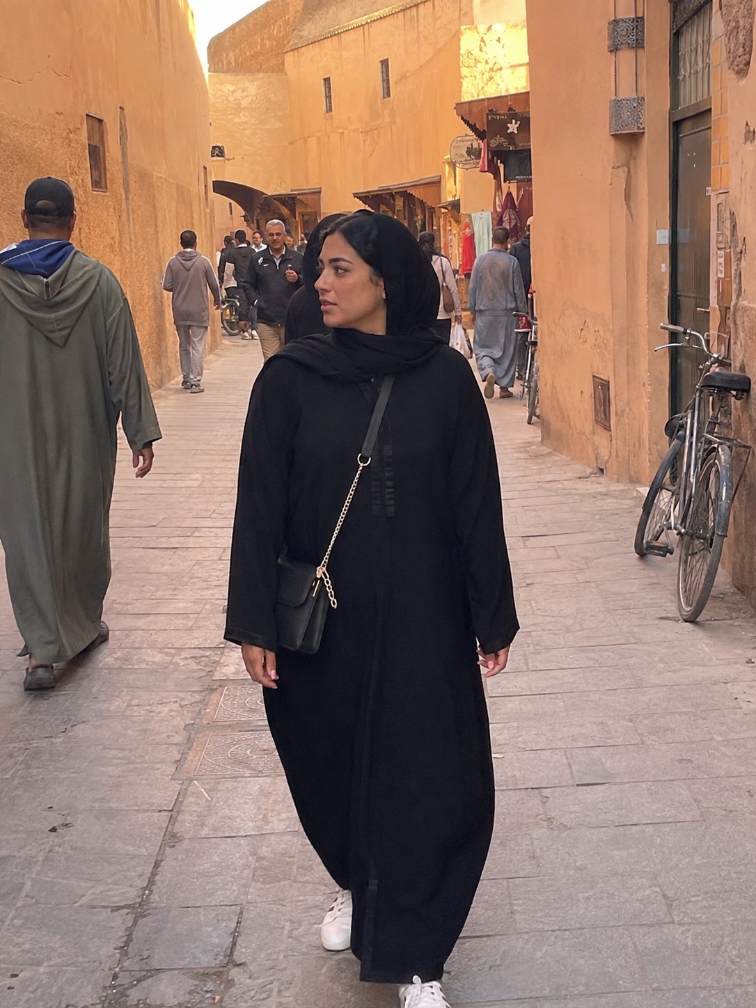 History of the abaya as a traditional loose covering garment