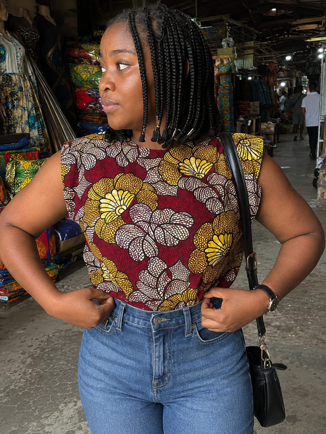 Fold-Shoulder Ankara Top Tucked into High-Waisted Jeans