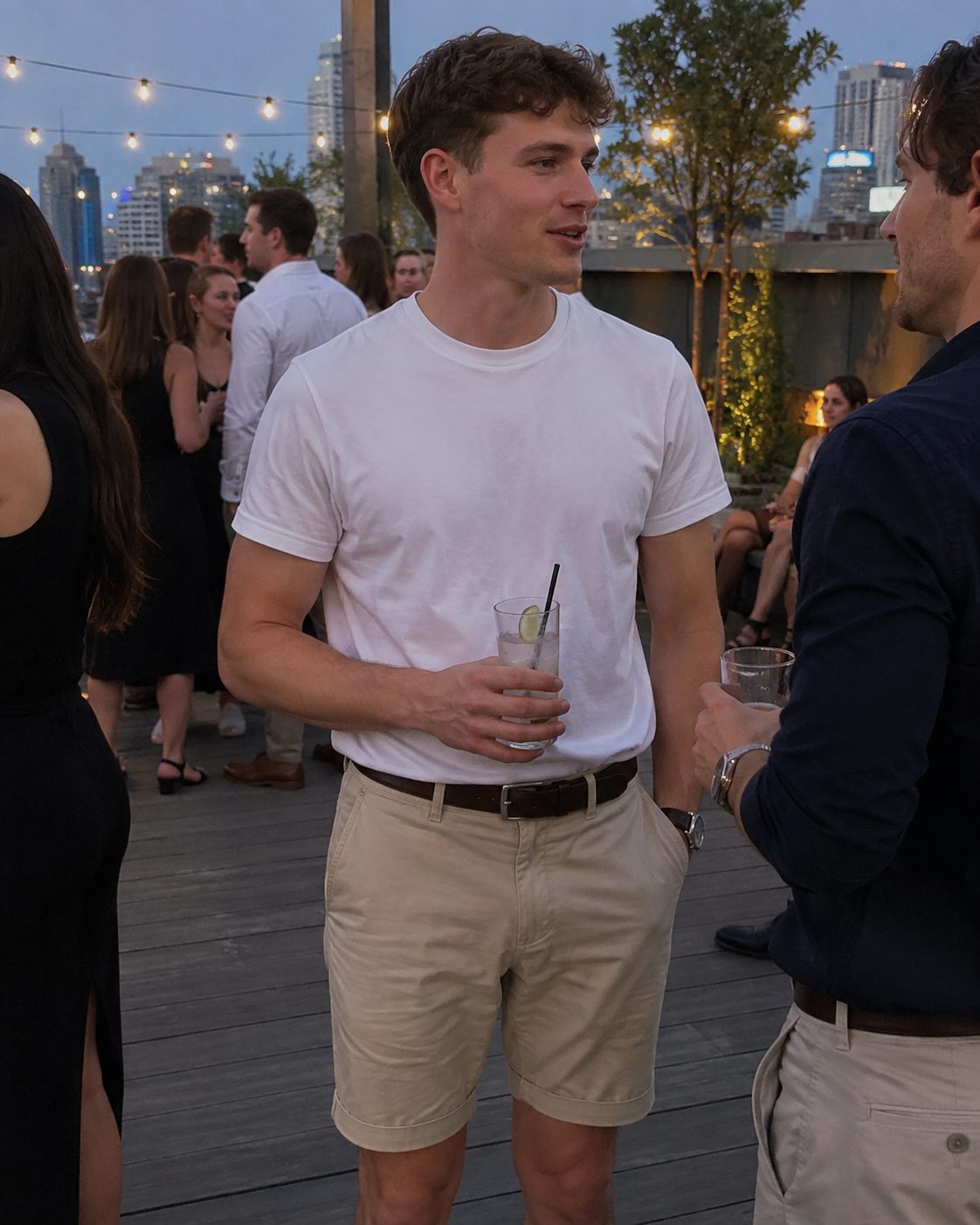 Tailored Shorts with a Tucked Tee for a Rooftop Hangout