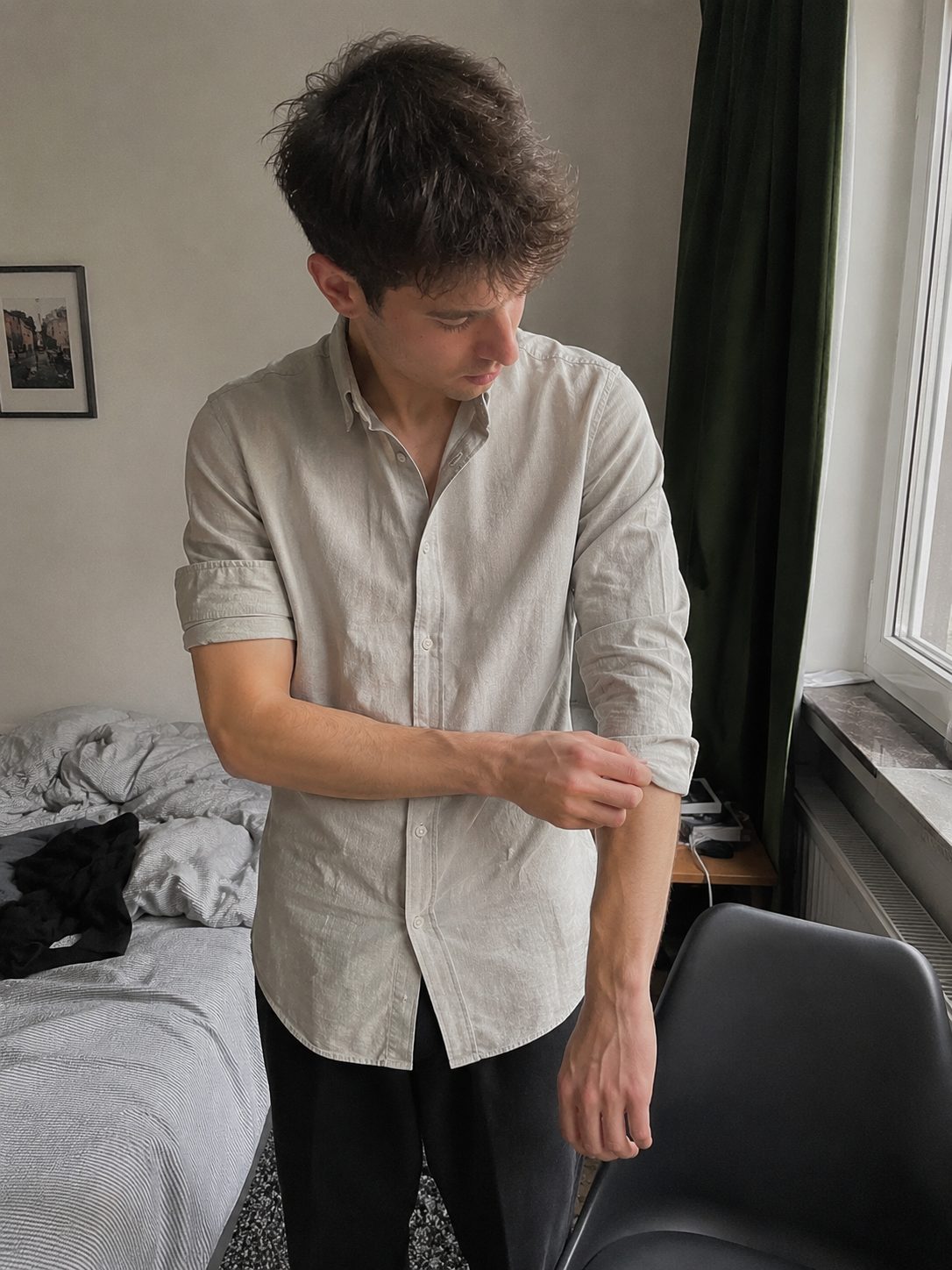 Roll Shirt Sleeves in Two Even Folds, Stopping Above the Elbow