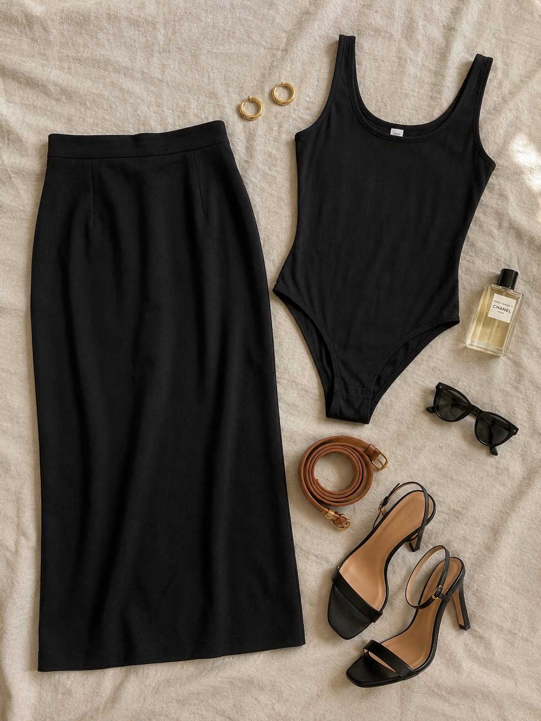 High-waisted midi with a bodysuit flat lay